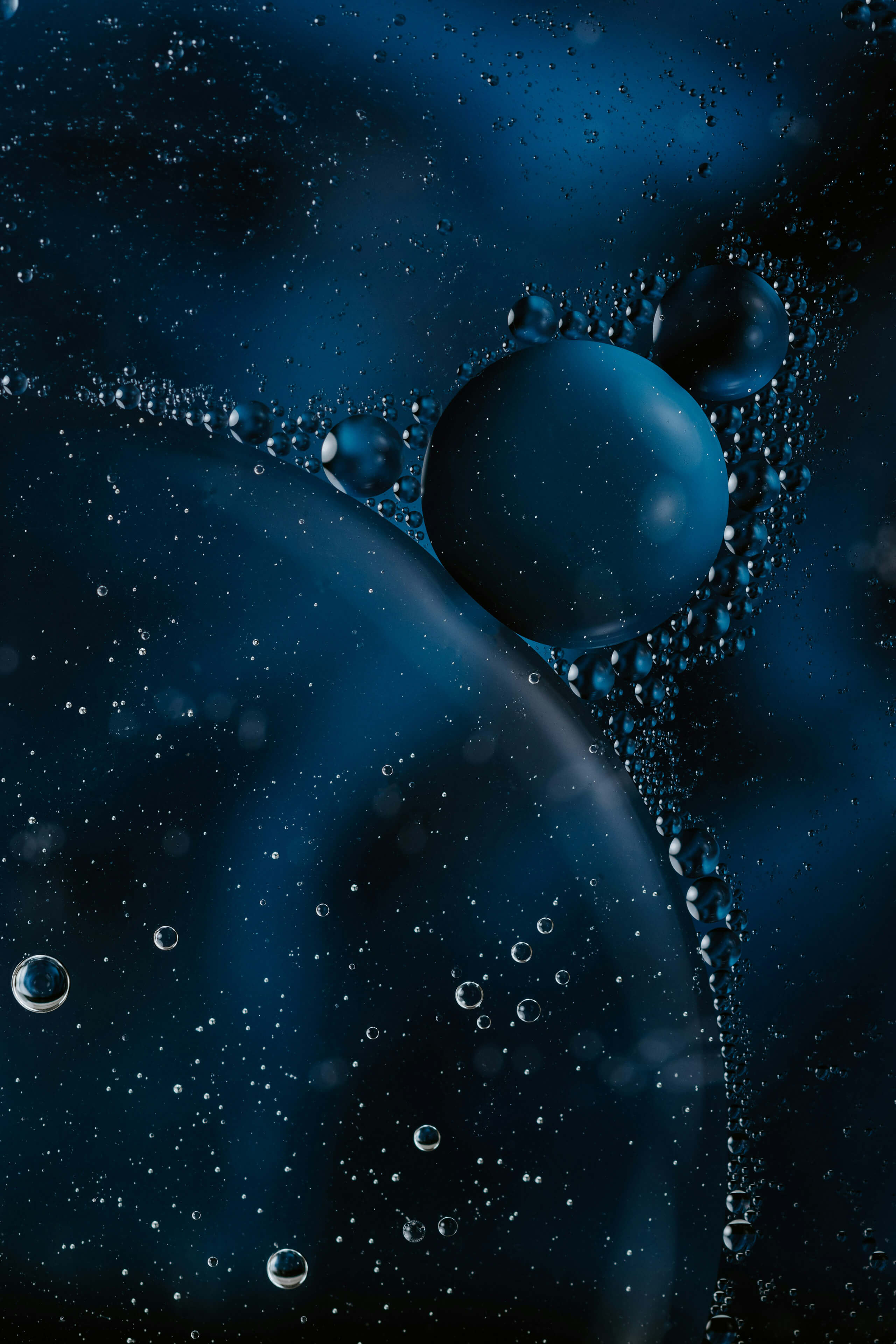 Abstract image of fluorescent dye diffusing in solution, illustrating reagent behavior in a laboratory context